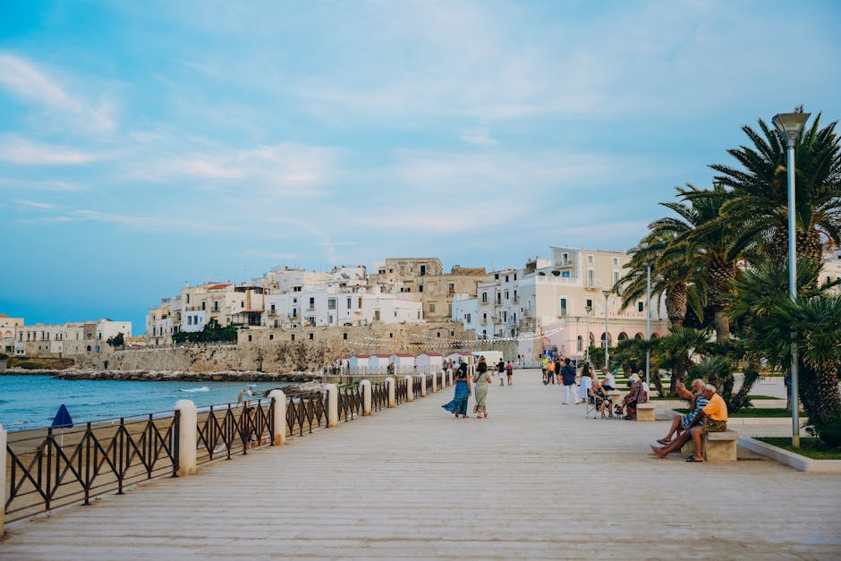 Explore the picturesque Vieste promenade in Apulia, Italy, featuring beautiful architecture and a vibrant waterfront