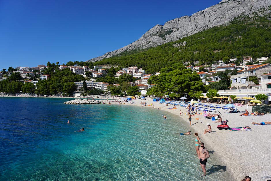 Relaxing beach scene at Baška Voda with clear waters and scenic views